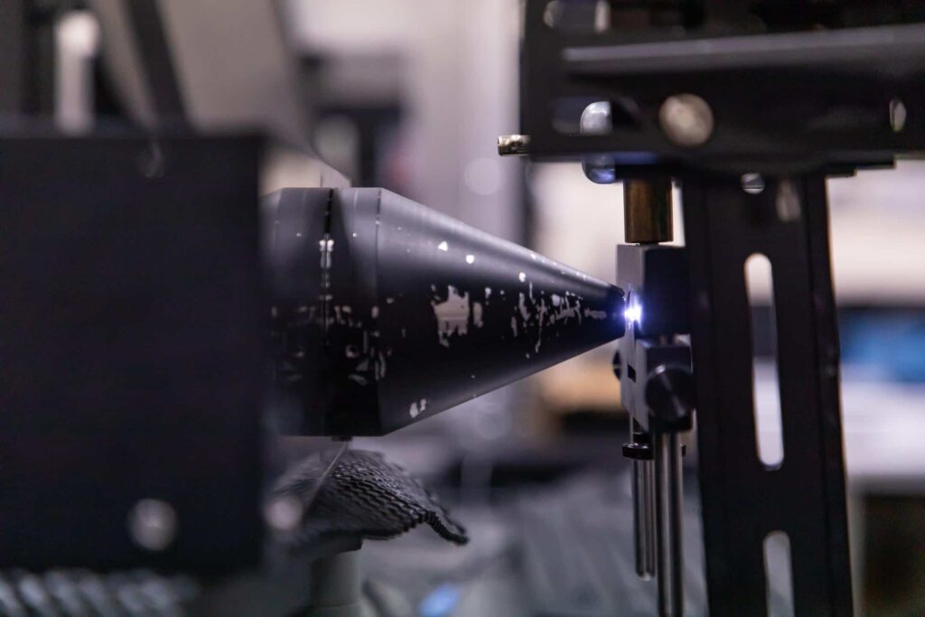 The LIBS laser being fired during the calibration process - Image Credit United Kingdom Atomic Energy Authority