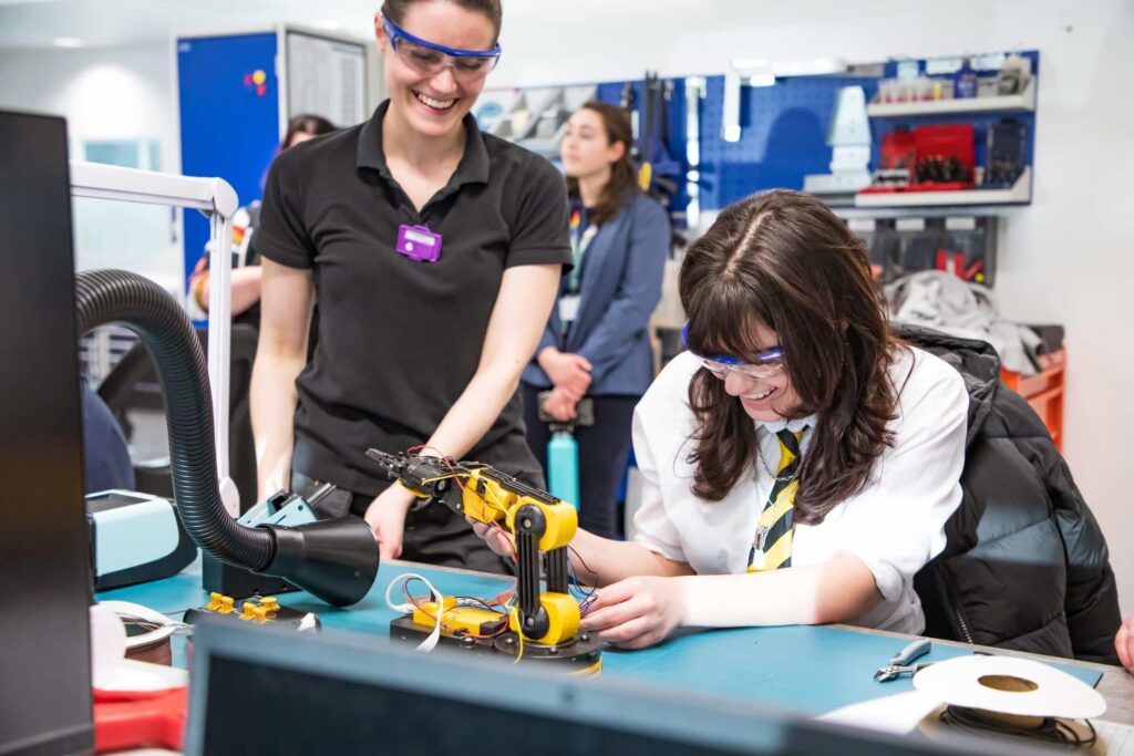 Women in Engineering working at a facility.