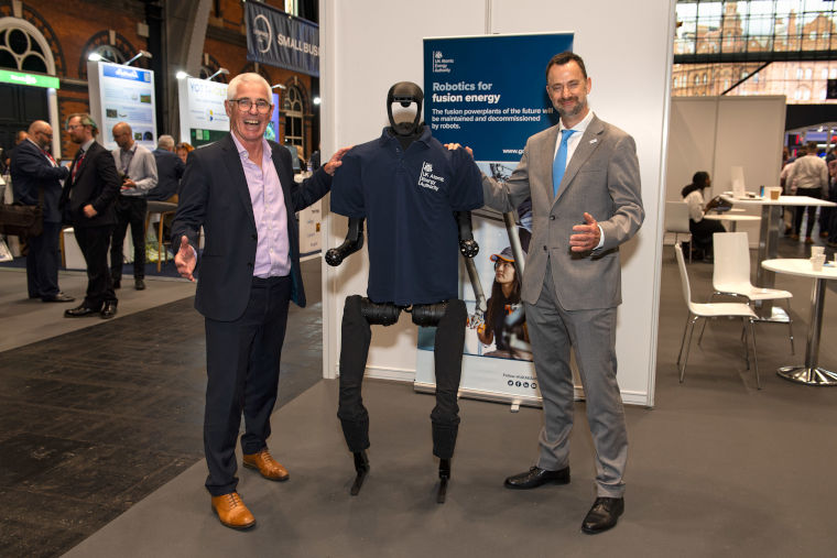 Dr Paul Bate, CEO of UKSA, and Prof. Rob Buckingham with a humanoid robot — courtesy of the Robotics and AI Collaboration (RAICo).
