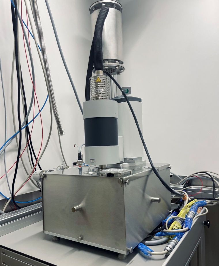 The Differential Scanning Calorimeter Precision and Mass Spectrometer in the research room.