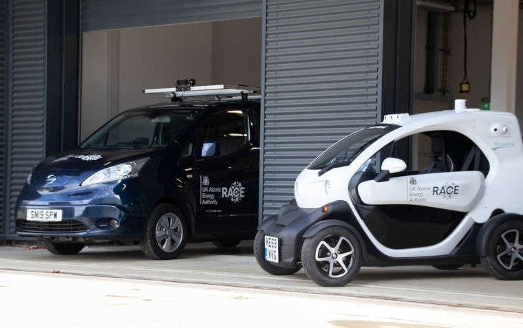 2 autonomous vehicles parked at the facility