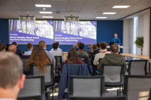 Participants of the quality week event watch a presentation by UKAEA.