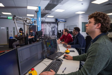 A controller in the remote handling control room.