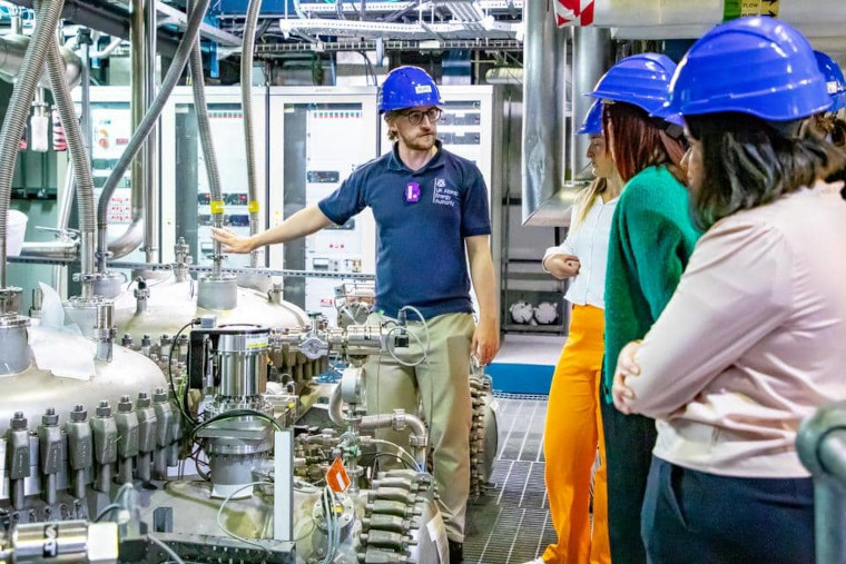 Students at the Tritium Fule Cycle facility learning from an expert.