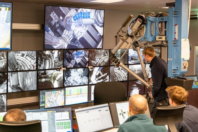 people in control room