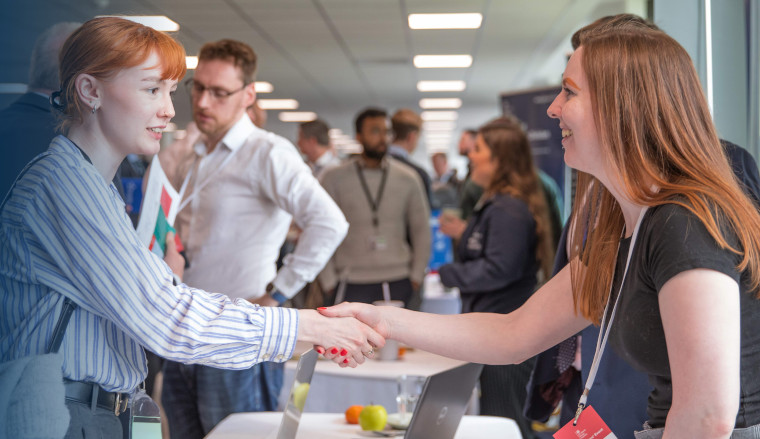 People meeting for the first time at an event.