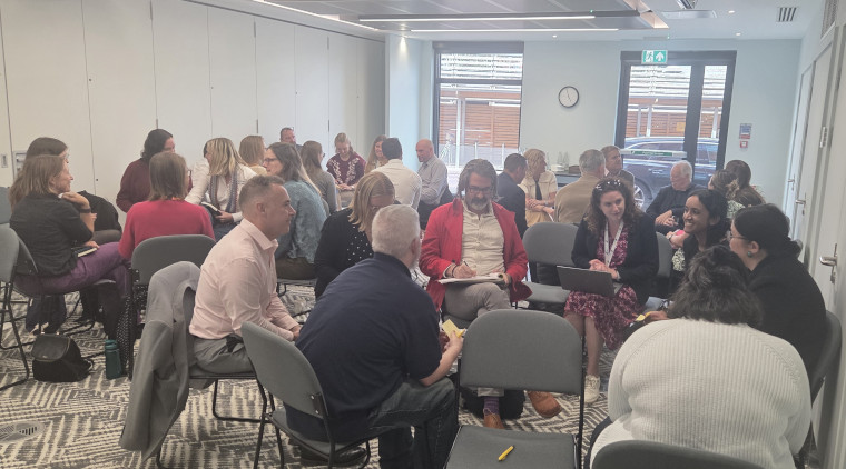 Stakeholders at a workshop at the Milton Park Bee House.