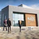 Workers enter the RACE building.