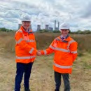 Staff shaking hands as UK Industrial Fusion Solutions is stood up.