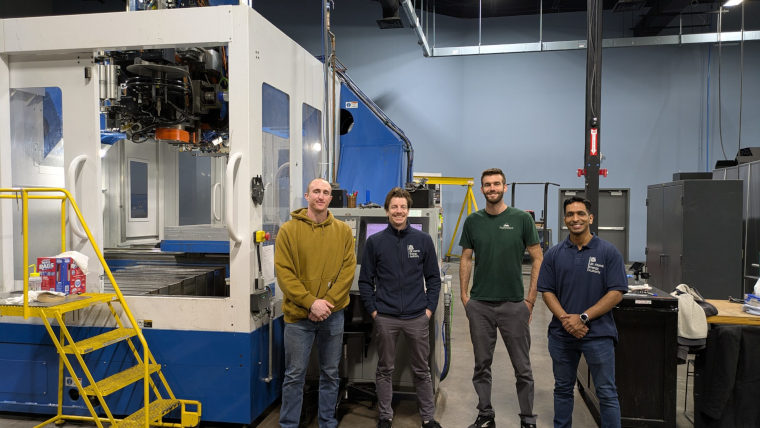 4 experts in the UKAEA and Fabrisonic team at the testing facility.