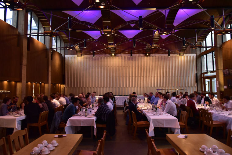 Student of the Culham Plasma Physics Summer School sitting and socialising at the banquet.