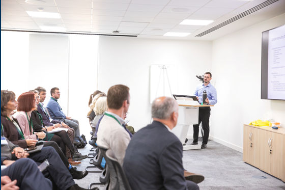 A UKAEA procurement expert giving a presentation to SMEs.