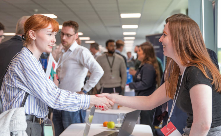 People meeting for the first time at an event.