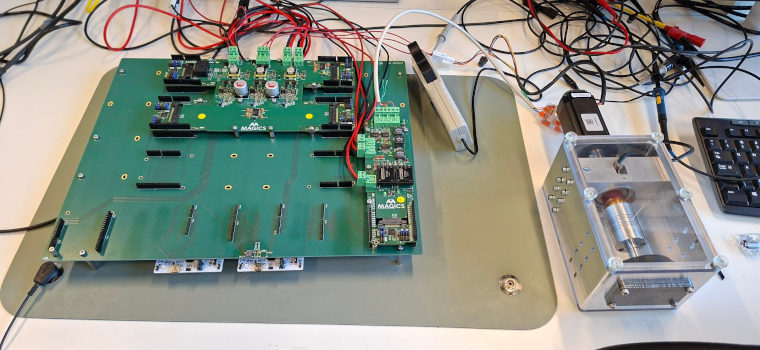 An electronic circuit board being worked on in a laboratory.