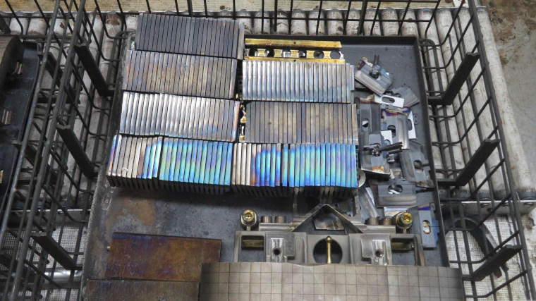 A shot from above of metal panels in a large cage at the Materials Detritiation Facility at the UK Atomic Energy Authority.
