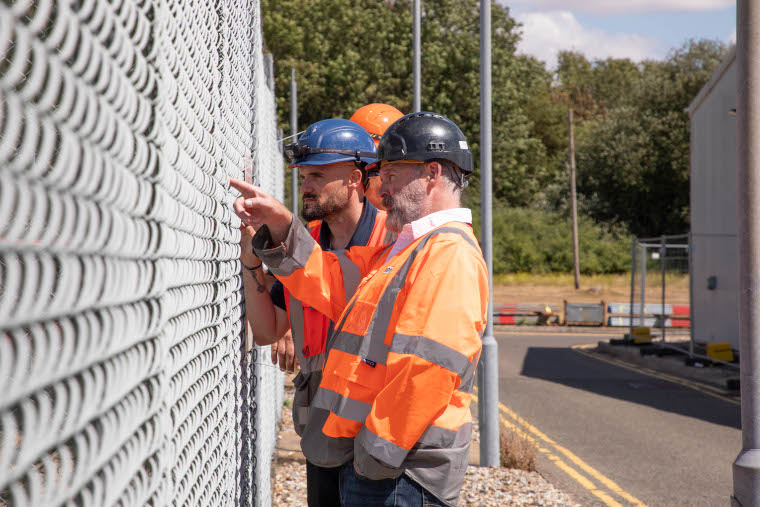 3 expert workers problem solving at the UK Atomic Energy Authority.